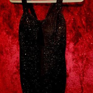 Tight black mini hoco dress with keyhole in front